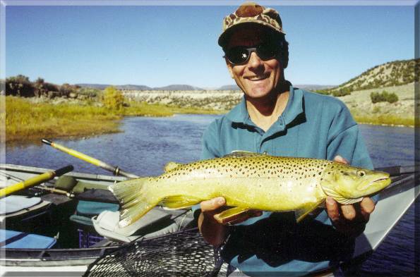 Steve Dotson show off his Shangri-La Brown Trout